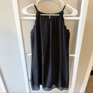 Scalloped edge little black dress